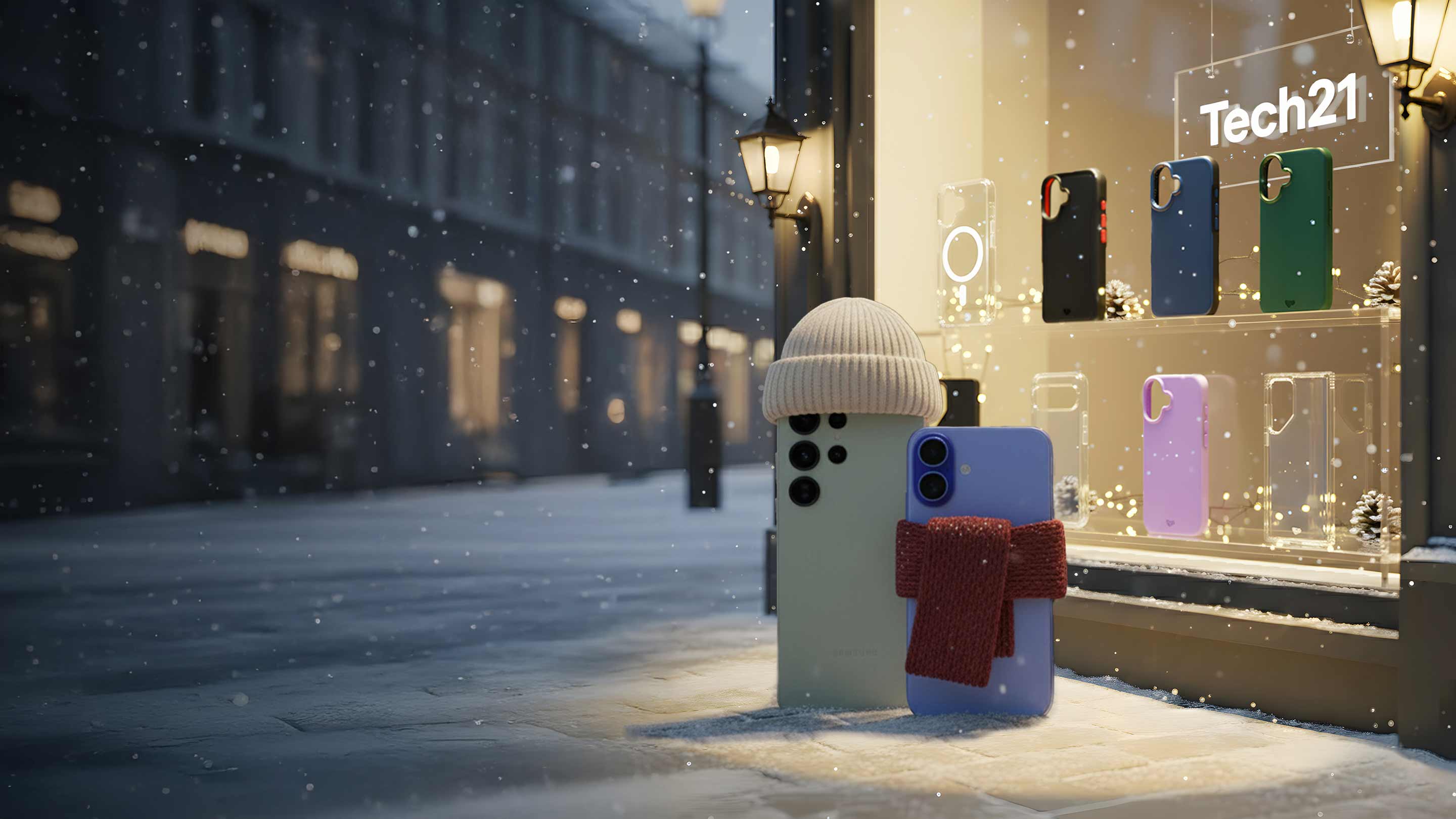 A Samsung S25 and iPhone 17 stand bundled up in knit hat and scarf out in the snow on a street corner looking into a store window with Tech21 cases. Text in the window reads Tech21.